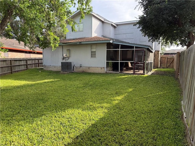11614 Coleta Creek Dr, Corpus Christi, TX 78410 - rear view of house with a fenced backyard and a sunroom
