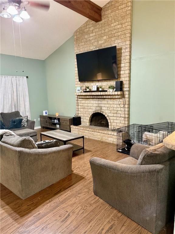 11614 Coleta Creek Dr, Corpus Christi, TX 78410 - living room with wood finished floors, ceiling fan, and a fireplace