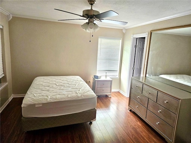 4725 Shea Pkwy, Corpus Christi, TX 78413 - bedroom with crown molding, baseboards, and dark wood-type flooring