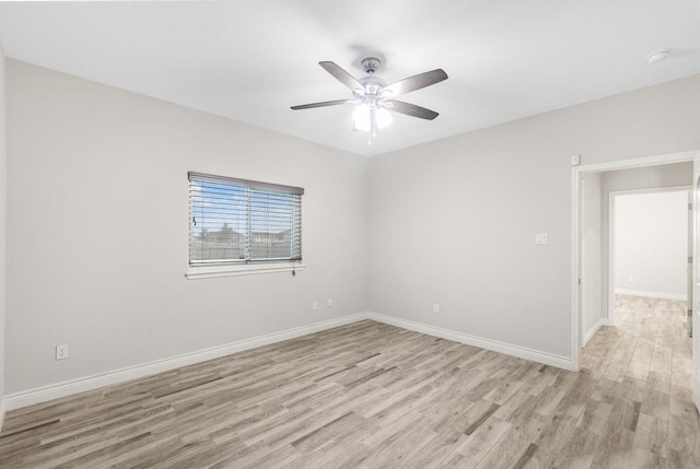 unfurnished room with ceiling fan and light wood-type flooring