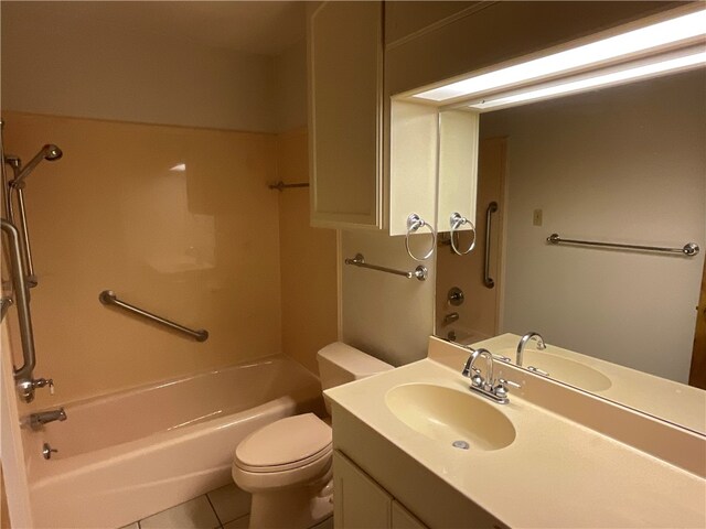 full bathroom with toilet, tub / shower combination, vanity, and tile patterned floors