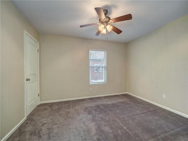 1305 S Whitney St, Aransas Pass, TX 78336 - carpeted spare room with baseboards and a ceiling fan
