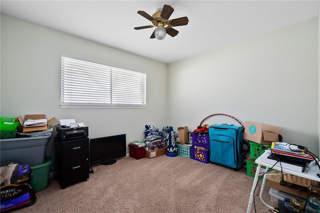 game room with ceiling fan and carpet floors