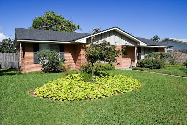 single story home featuring a front yard