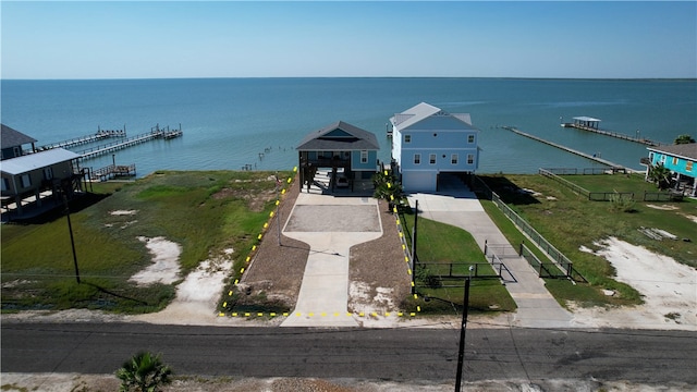 drone / aerial view featuring a water view