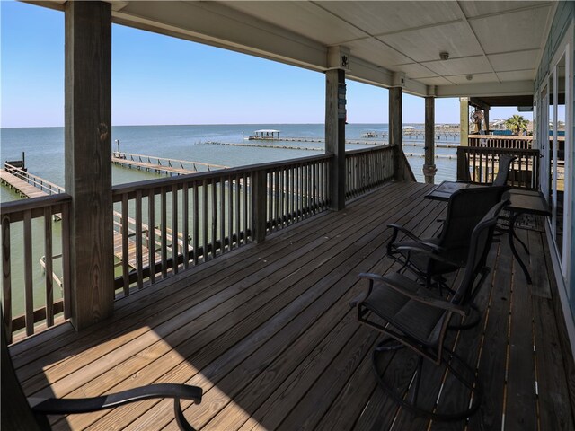 wooden terrace with a water view