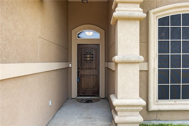 7205 Lake Serenity Dr, Corpus Christi, TX 78414 - doorway to property featuring stucco siding