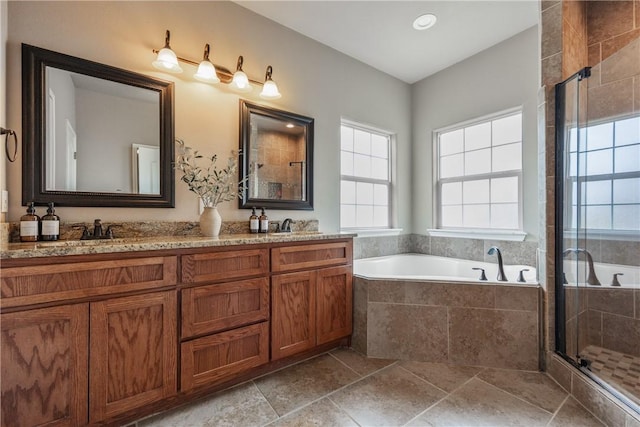 7205 Lake Serenity Dr, Corpus Christi, TX 78414 - bathroom featuring plenty of natural light, a garden tub, a stall shower, and double vanity