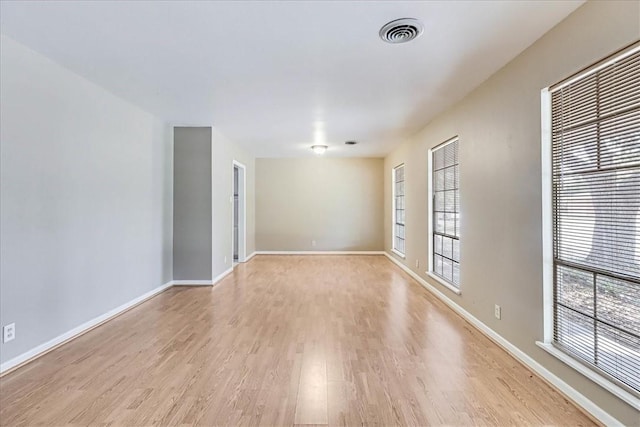 empty room featuring light hardwood / wood-style floors