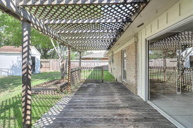 wooden deck with a lawn