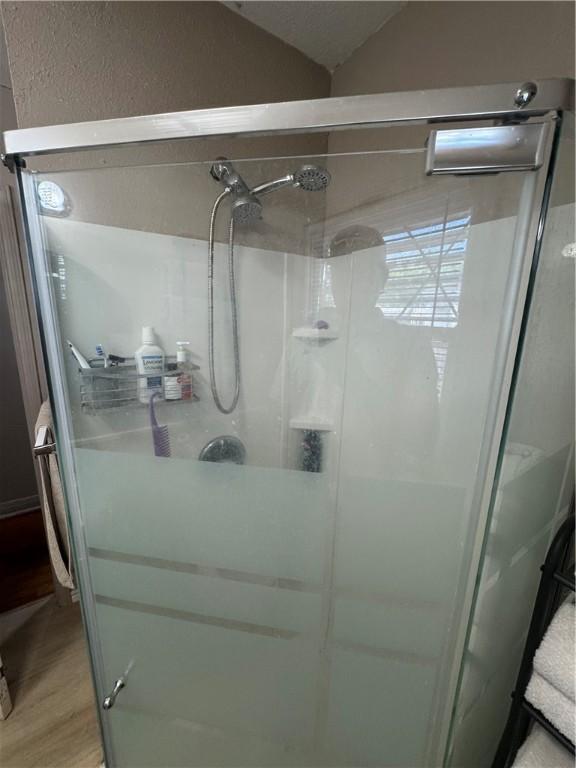 1210 Brentwood Dr, Corpus Christi, TX 78404 - interior details featuring wood finished floors and a stall shower