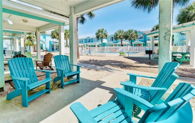 view of patio featuring a swimming pool