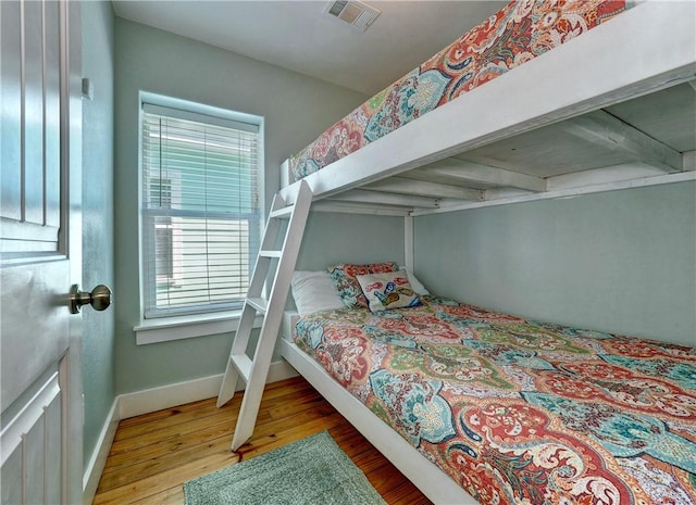 bedroom with light hardwood / wood-style flooring