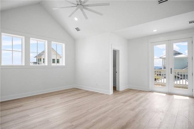 113 Spoonbill Prt, Aransas, TX 78373 - spare room featuring french doors, a ceiling fan, light wood-style flooring, recessed lighting, and high vaulted ceiling