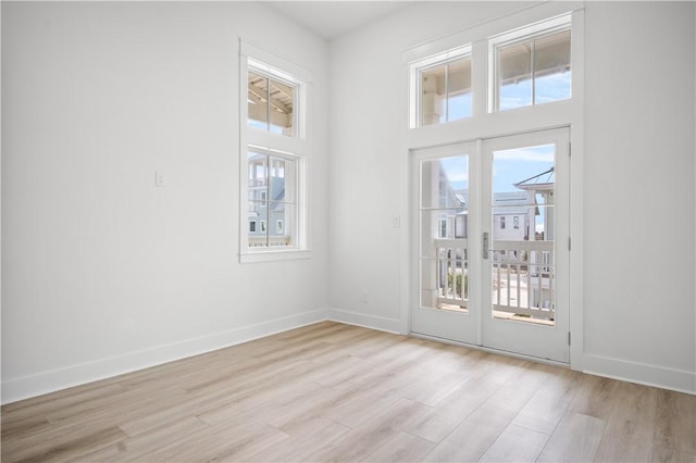 113 Spoonbill Prt, Aransas, TX 78373 - unfurnished room featuring light wood-style flooring