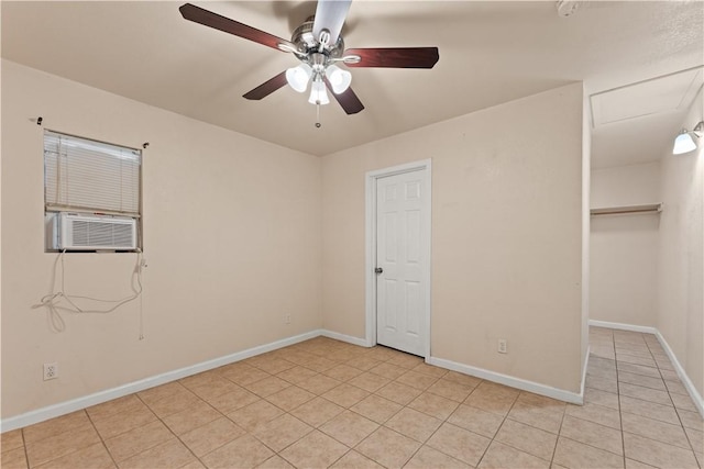 unfurnished bedroom featuring ceiling fan, cooling unit, and light tile patterned floors