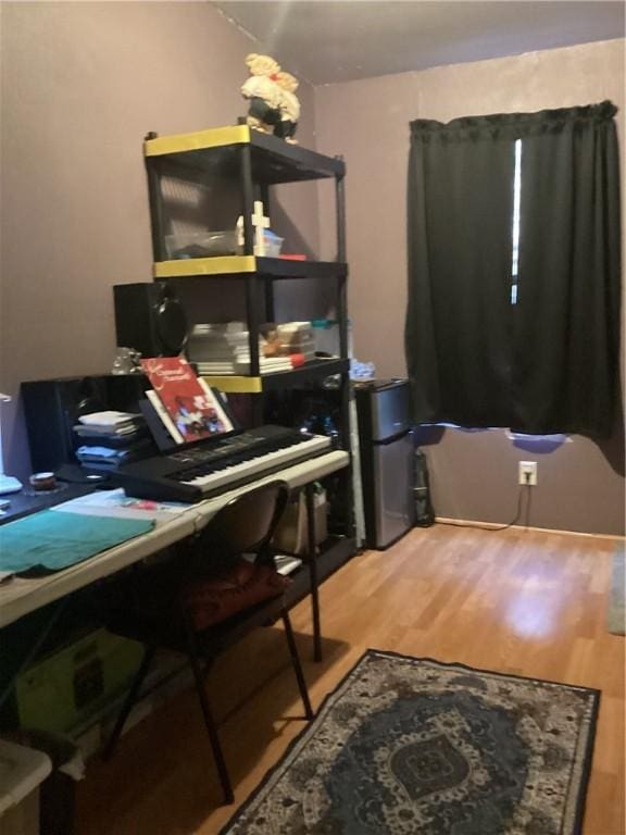 home office featuring wood-type flooring