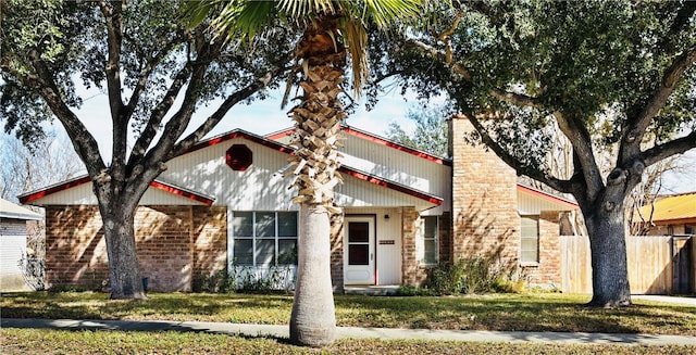 view of front of property with a front lawn