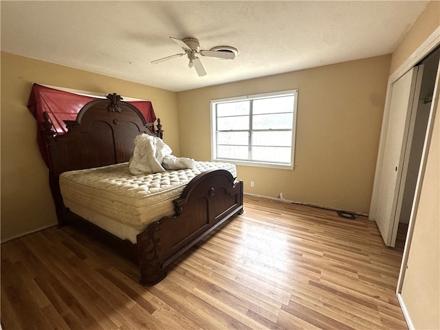 636 S 11th St, Aransas Pass, TX 78336 - bedroom featuring light wood-style flooring and ceiling fan