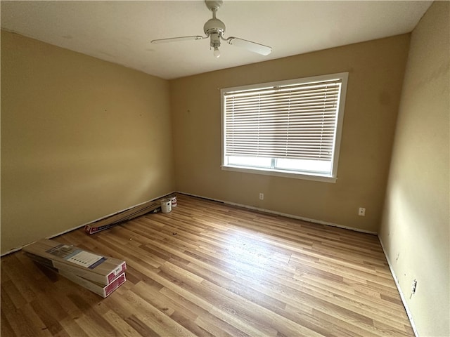 636 S 11th St, Aransas Pass, TX 78336 - empty room with light wood-style flooring and a ceiling fan
