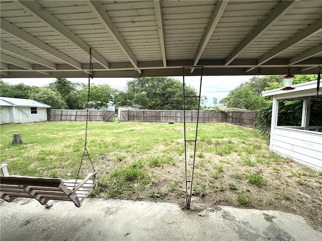 636 S 11th St, Aransas Pass, TX 78336 - fenced backyard featuring an outbuilding