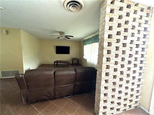 636 S 11th St, Aransas Pass, TX 78336 - tiled living area with a ceiling fan