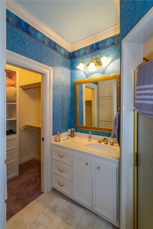 bathroom featuring vanity and crown molding