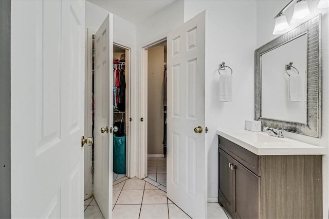 bathroom with vanity and tile patterned floors