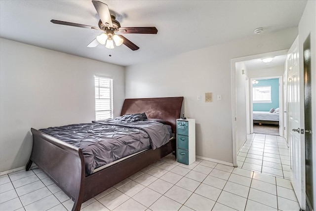 bedroom featuring ceiling fan and light tile patterned floors