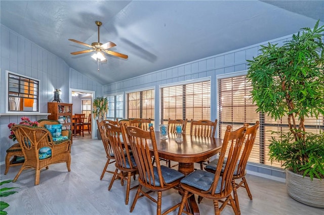 dining room featuring lofted ceiling and ceiling fan