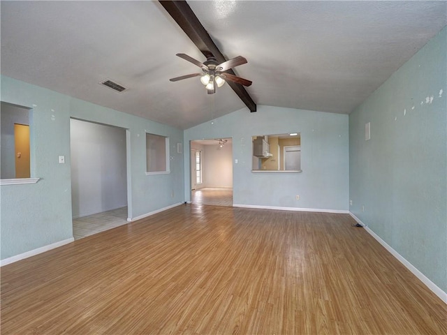 2100 Memorial Pkwy, Portland, TX 78374 - unfurnished living room featuring a ceiling fan, wood finished floors, and baseboards