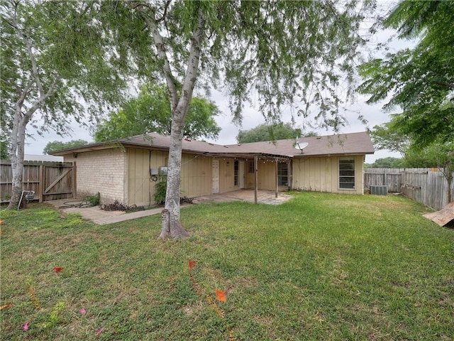 2100 Memorial Pkwy, Portland, TX 78374 - back of property with a patio area, a gate, and central air condition unit