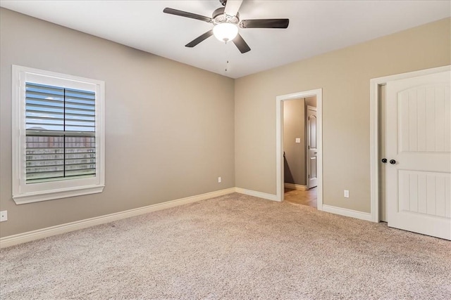 6241 Lago Vista Dr, Corpus Christi, TX 78414 - unfurnished bedroom with light carpet and ceiling fan