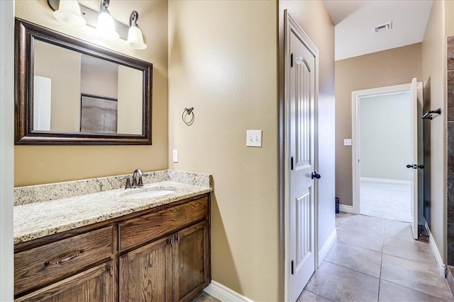 6241 Lago Vista Dr, Corpus Christi, TX 78414 - bathroom featuring vanity and tile patterned flooring