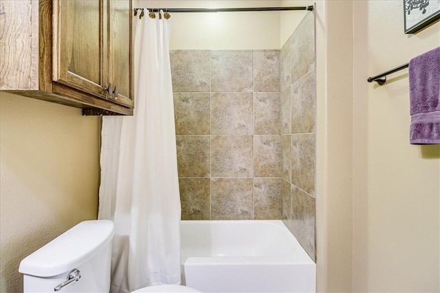 6241 Lago Vista Dr, Corpus Christi, TX 78414 - bathroom featuring toilet and shower / tub combo with curtain