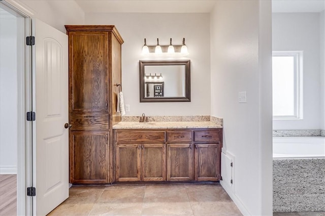 6241 Lago Vista Dr, Corpus Christi, TX 78414 - full bath featuring vanity, a bath, and tile patterned flooring