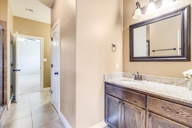 6241 Lago Vista Dr, Corpus Christi, TX 78414 - bathroom with vanity, tile patterned flooring, and an enclosed shower