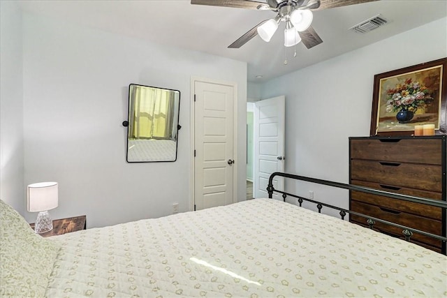 bedroom featuring visible vents and ceiling fan