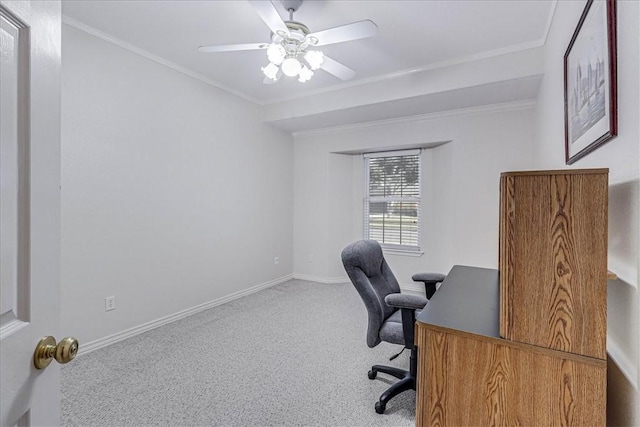 carpeted home office with ornamental molding and ceiling fan