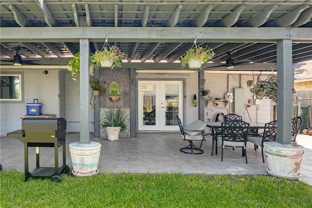 view of patio / terrace featuring french doors and ceiling fan