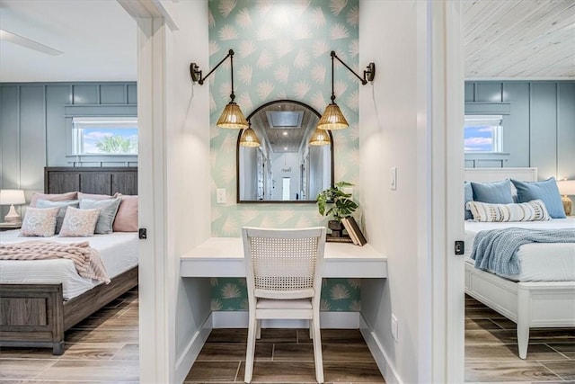 1911 Eskridge Rd, Port Aransas, TX 78373 - bedroom featuring wood finished floors and wallpapered walls