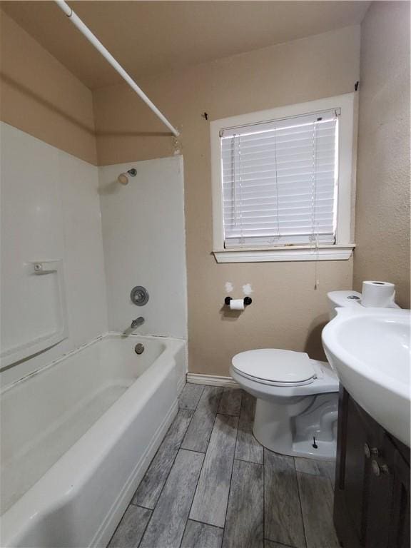 2838 Willard St, Corpus Christi, TX 78404 - bathroom featuring wood finish floors, shower / bathtub combination, and vanity