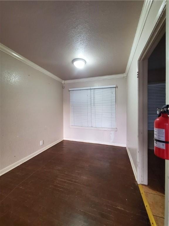 2838 Willard St, Corpus Christi, TX 78404 - spare room featuring ornamental molding, wood finished floors, and a textured ceiling