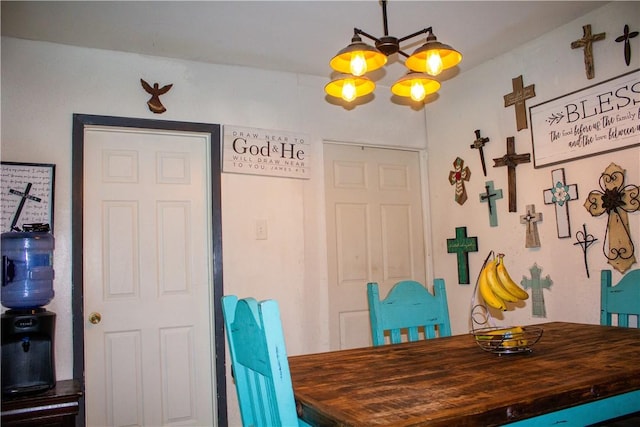 405 W Walton St, Beeville, TX 78102 - dining space featuring a chandelier