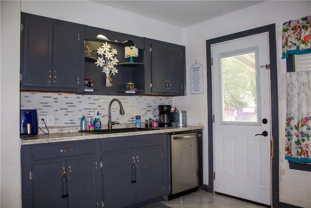 405 W Walton St, Beeville, TX 78102 - bar area featuring stainless steel dishwasher and backsplash