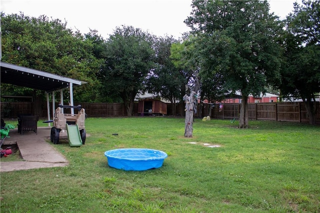 405 W Walton St, Beeville, TX 78102 - view of fenced backyard
