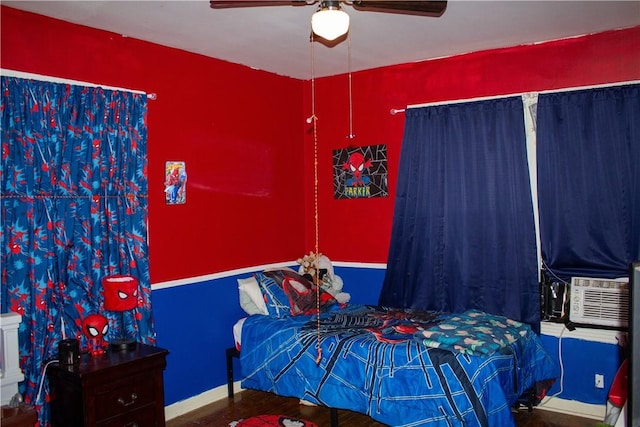 405 W Walton St, Beeville, TX 78102 - bedroom with a ceiling fan and wood finished floors