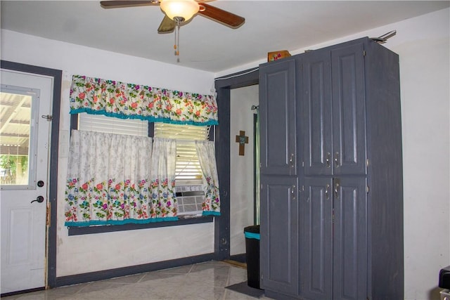 405 W Walton St, Beeville, TX 78102 - interior space with a ceiling fan and baseboards