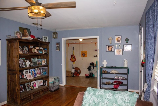 405 W Walton St, Beeville, TX 78102 - bedroom featuring wood finished floors and ceiling fan