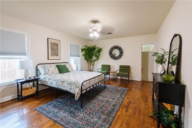 253 Melrose, Corpus Christi, TX 78404 - bedroom with wood finished floors, baseboards, and ceiling fan